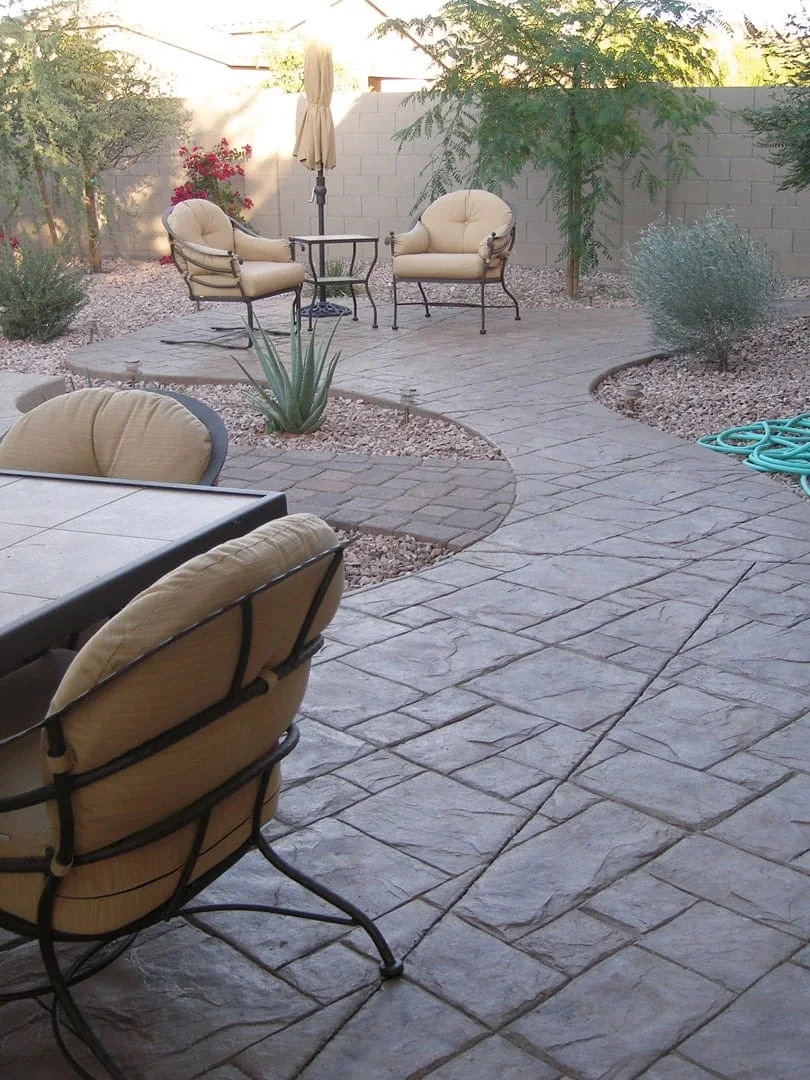 An outdoor sitting area leaves room for circulation and planting.