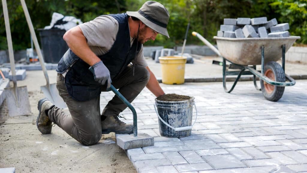 DIY – How to Lay Pavers (Step-by-Step Guide) 9 Step 8 Compact the Pavers and Add Joint Sand